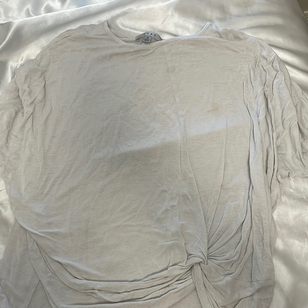 Plain white shirt with tie in the front
